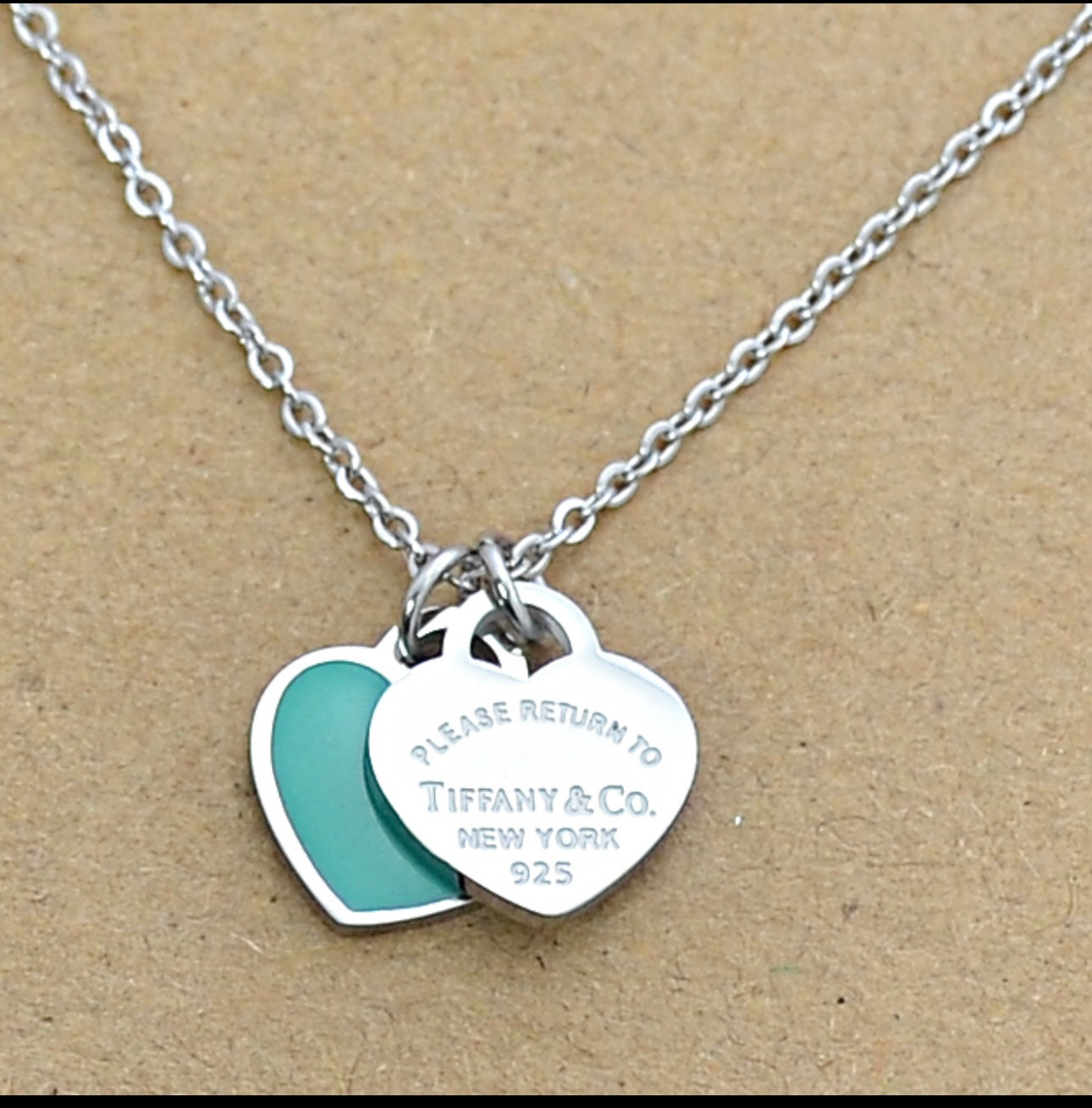 Collar de corazón azul y rosa