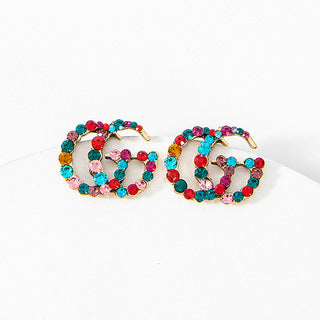 Multi color g earrings