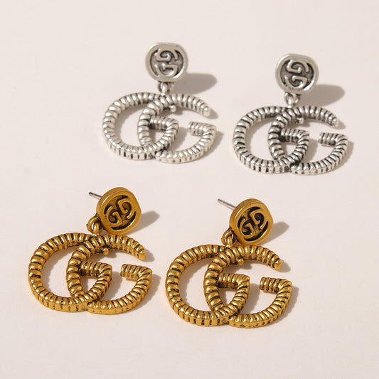 G snake drop earrings